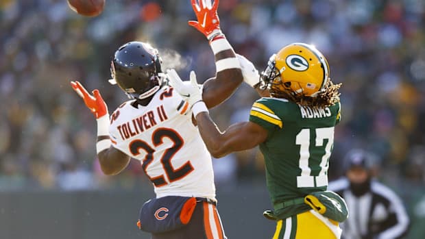 Chicago Bears cornerback Kevin Toliver II (22) breaks up the pass intended for Green Bay Packers wide receiver Davante Adams (17) during the second quarter at Lambeau Field.